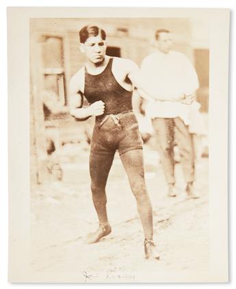 (SPORT--BOXING.) RING MAGAZINE. 16 black and white photographs of African American boxers from the archives of Ring Magazine.